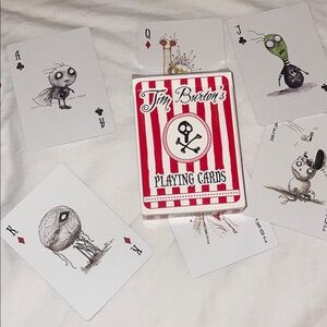 2012 Tim Burton Red and White Striped Playing Cards with Black Skull Motif